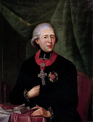 Carl Theodor von Dalberg (1744-1817) war Kurfürst von Mainz und wurde nach der Gründung des Rheinbundes Fürstprimas. Er gründete die Universität von Aschaffenburg, der er auch als Rektor vorstand. Zwischen 1810 und 1813 war er Großherzog von Frankfu