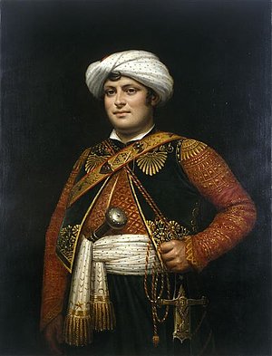 Raza Roustan (1780-1845) begleitete Napoléon Bonaprte vom Jahre 1798 bis zum Jahre 1814 als Diener und Leibwächter. Im Jahre 1815 folgte er dem Kaiser nicht erneut.